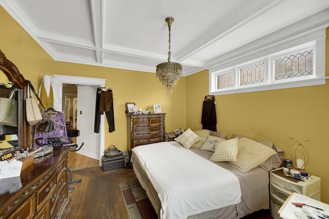 bedroom featuring a chandelier, beamed ceiling, coffered ceiling, and wood finished floors