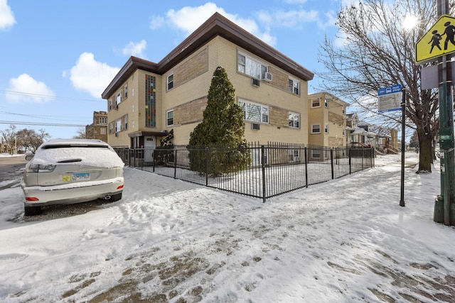 view of snow covered property