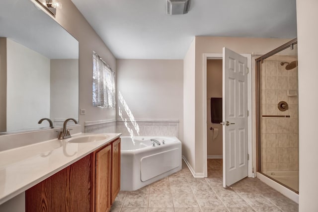 full bathroom featuring tile patterned floors, visible vents, a shower stall, a bath, and vanity