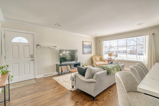 living room featuring dark wood-type flooring and ornamental molding