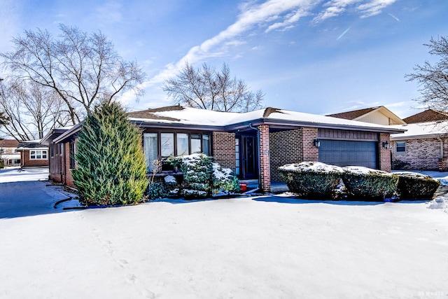 single story home with a garage