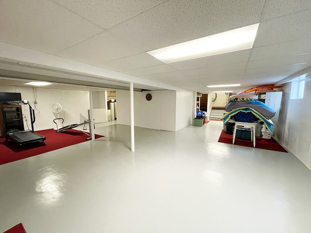 basement featuring a drop ceiling