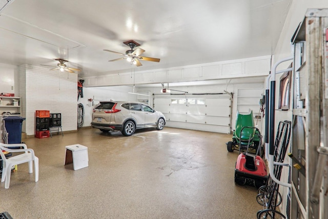 garage featuring ceiling fan and a garage door opener