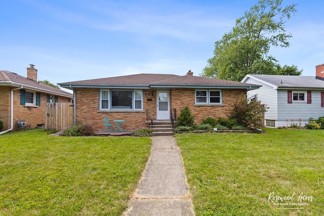 view of front facade featuring a front yard