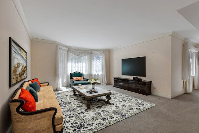 carpeted living room featuring ornamental molding