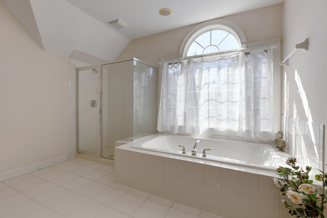 bathroom with tile patterned floors and independent shower and bath