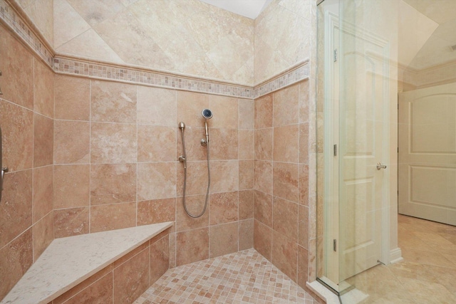 bathroom with tiled shower