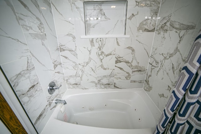 full bathroom with a combined bath / shower with jetted tub