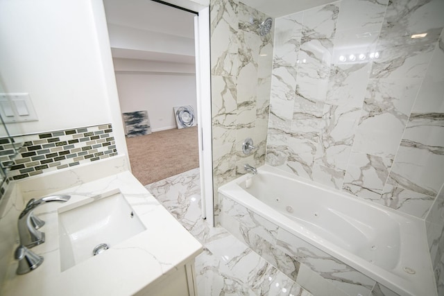 full bath with marble finish floor, a combined bath / shower with jetted tub, and vanity