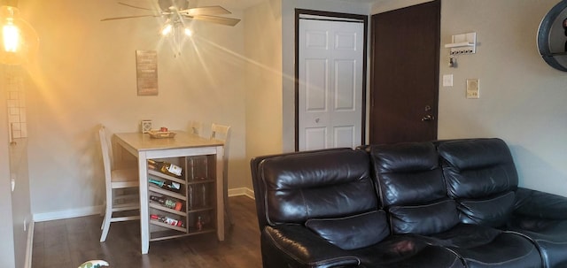 interior space featuring dark hardwood / wood-style flooring and ceiling fan