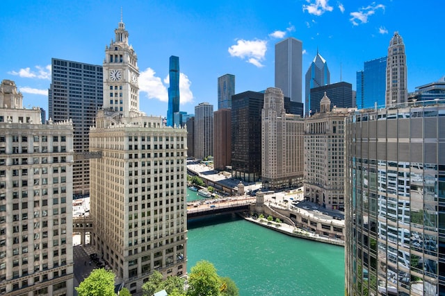 property's view of city with a water view