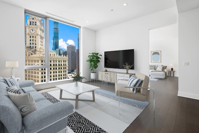 living room featuring hardwood / wood-style flooring and floor to ceiling windows