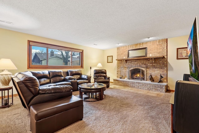 living room with a fireplace, visible vents, carpet flooring, a textured ceiling, and baseboards