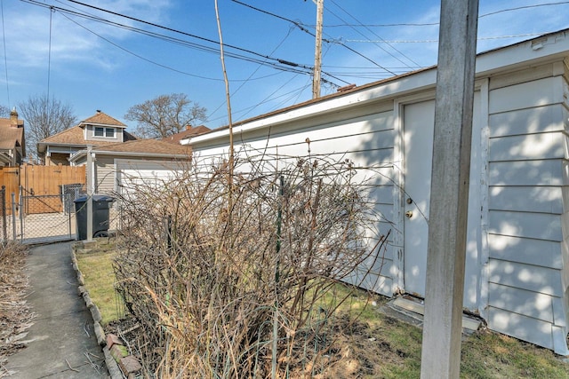 exterior space with fence and a gate