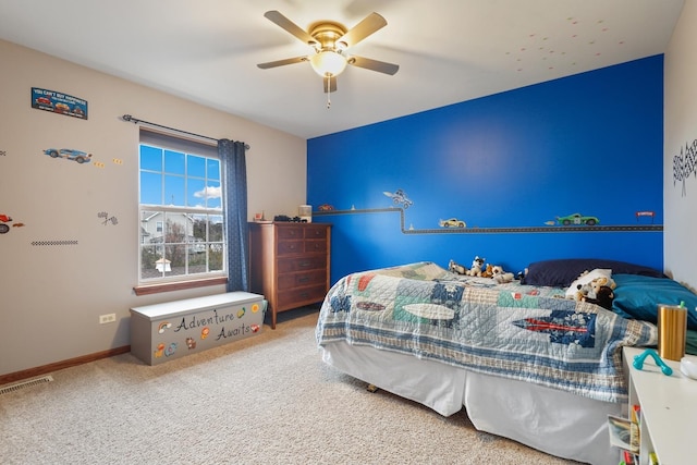 bedroom with ceiling fan and carpet