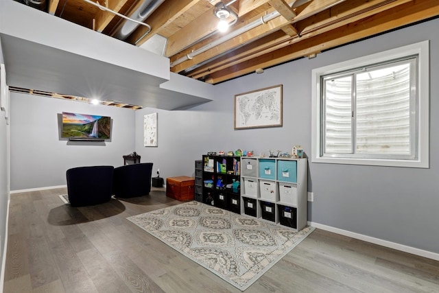 game room with hardwood / wood-style flooring