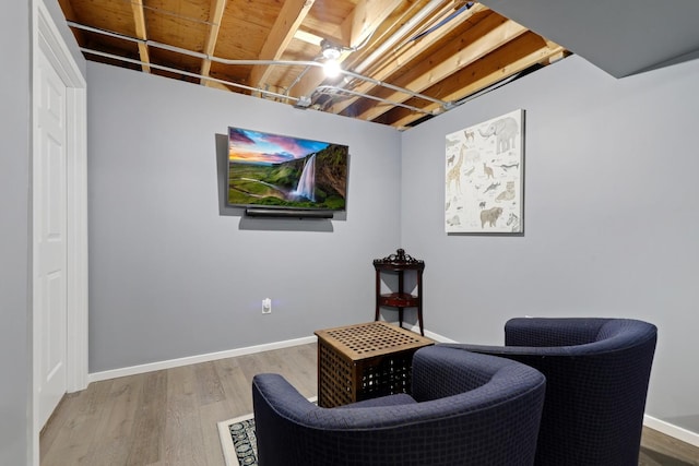 sitting room featuring wood-type flooring