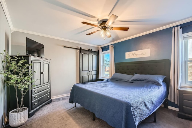 carpeted bedroom with baseboards, crown molding, a ceiling fan, and a barn door