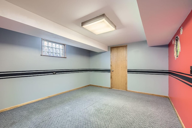 basement with baseboards and carpet floors