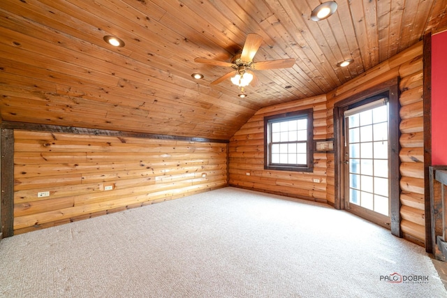 bonus room with vaulted ceiling, wooden ceiling, rustic walls, and carpet