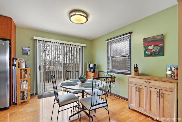 dining room featuring light hardwood / wood-style flooring