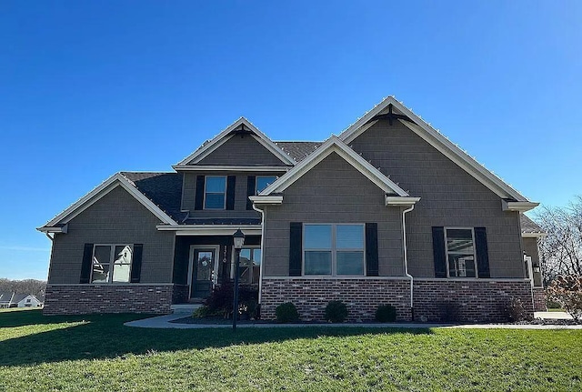 craftsman-style home with a front lawn