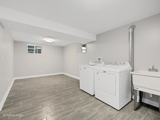 laundry area with independent washer and dryer