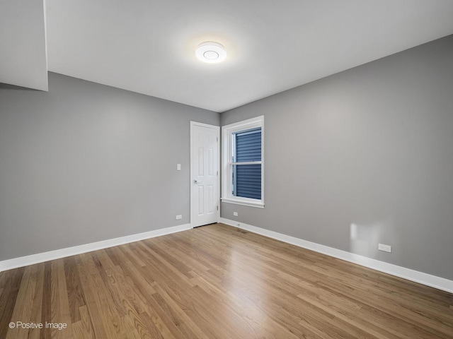 unfurnished room featuring light hardwood / wood-style floors