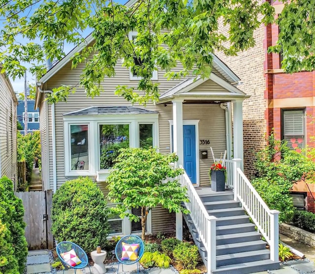 view of front of property with stairs