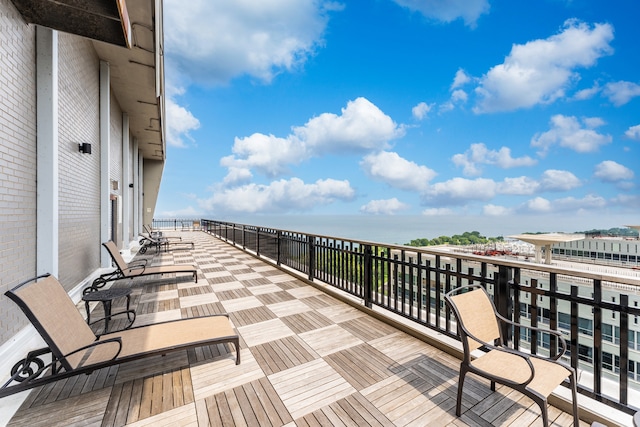 deck featuring a water view