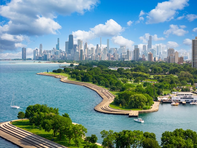 drone / aerial view with a water view and a city view