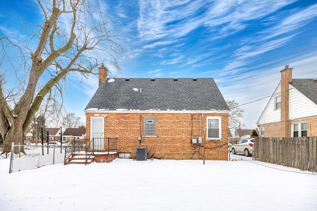 view of snow covered property