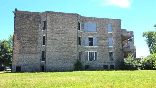 view of property with central AC unit