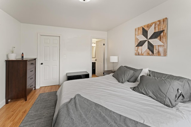 bedroom featuring light wood-style floors