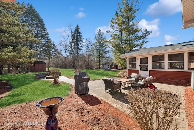 view of patio with a storage shed, an outdoor hangout area, and an outdoor structure