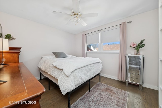 bedroom featuring beverage cooler, ceiling fan, baseboards, and wood finished floors