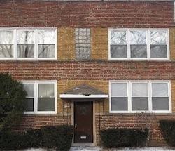 view of front of property featuring brick siding