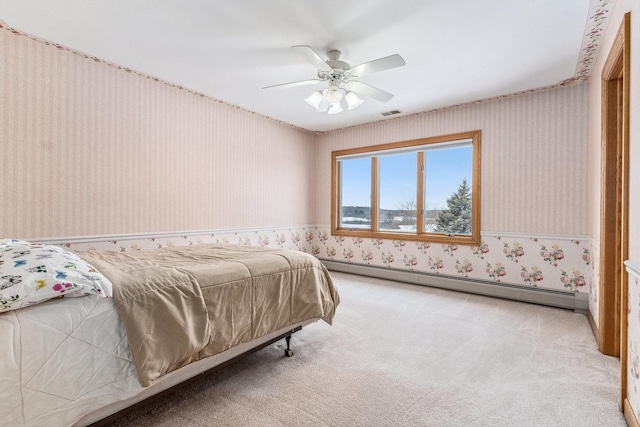 10848 Crystal Ridge Ct, Orland Park, IL 60467 - bedroom featuring a baseboard heating unit, wallpapered walls, carpet floors, visible vents, and ceiling fan