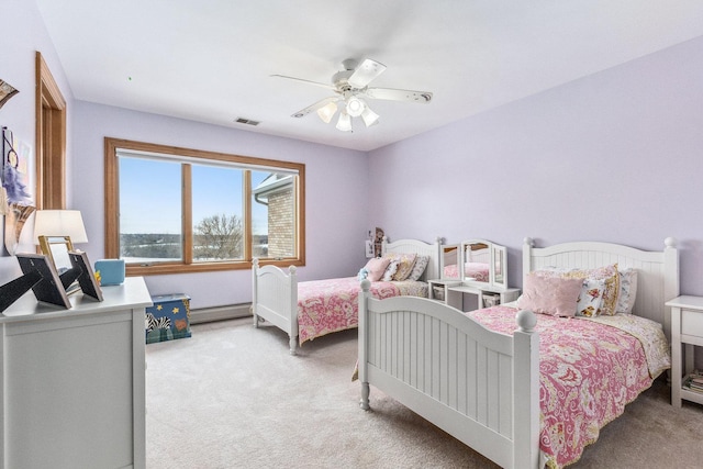 10848 Crystal Ridge Ct, Orland Park, IL 60467 - bedroom featuring baseboard heating, baseboards, light carpet, visible vents, and ceiling fan