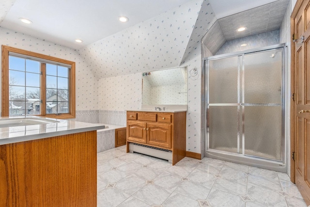 bathroom with vanity, independent shower and bath, a baseboard radiator, and lofted ceiling