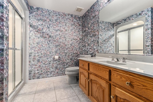 10848 Crystal Ridge Ct, Orland Park, IL 60467 - bathroom featuring visible vents, baseboards, tile patterned flooring, and wallpapered walls