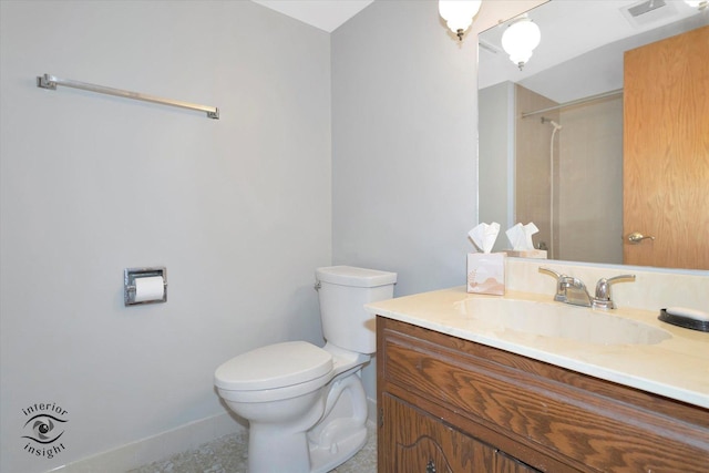 full bathroom featuring baseboards, visible vents, a shower, toilet, and vanity