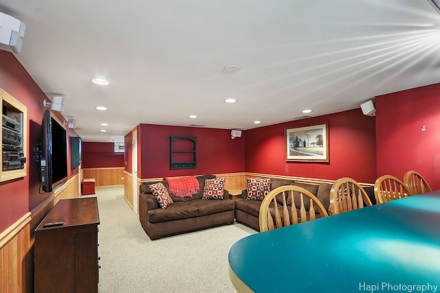 living area with carpet floors, wainscoting, and recessed lighting