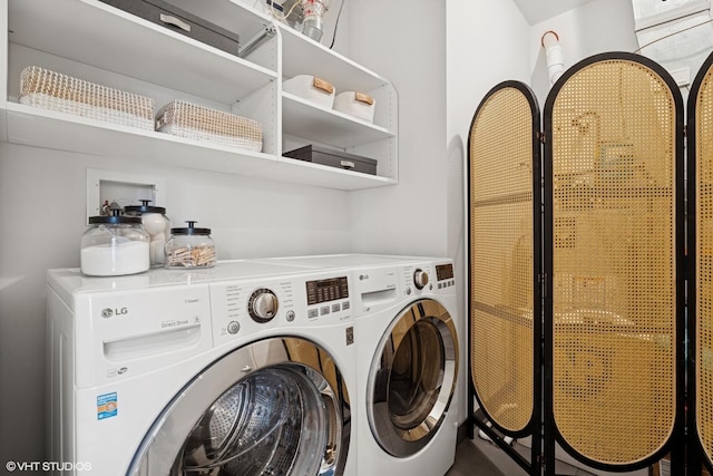 washroom with laundry area and washer and clothes dryer