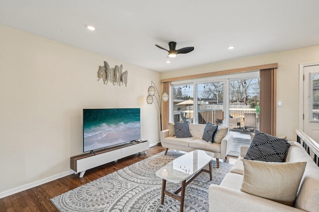 living room featuring recessed lighting, ceiling fan, baseboards, and wood finished floors