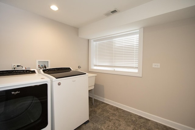 laundry area featuring laundry area, baseboards, visible vents, washer and dryer, and recessed lighting