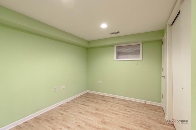 empty room with baseboards, recessed lighting, visible vents, and light wood-style floors