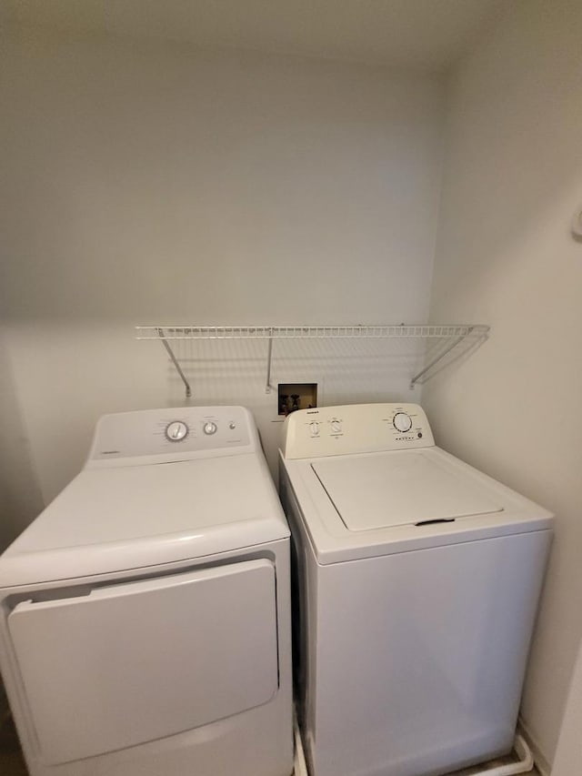 washroom featuring separate washer and dryer