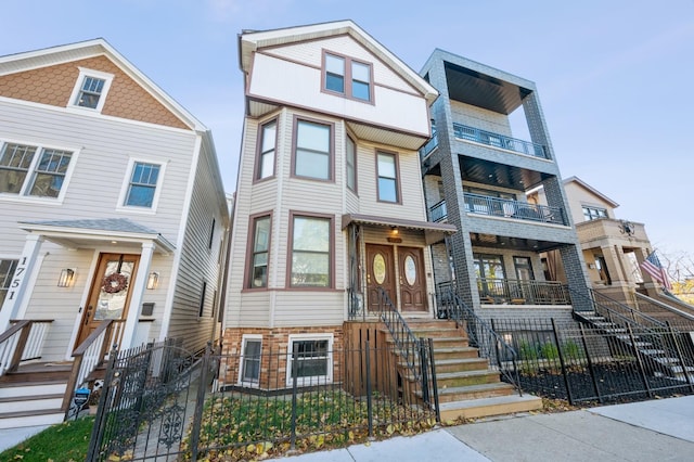 view of front facade with a fenced front yard