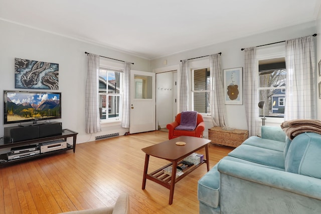 living room with hardwood / wood-style flooring and visible vents